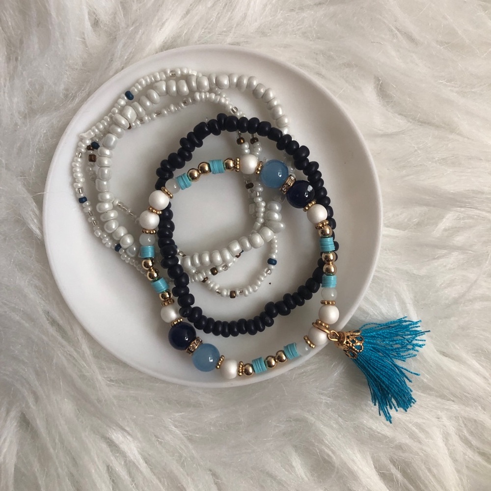 FIVE blue/white/gold tassel accent bead bracelets